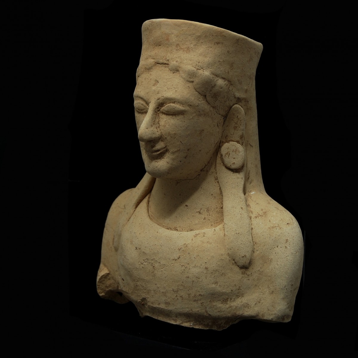 Archaic terracotta bust half links