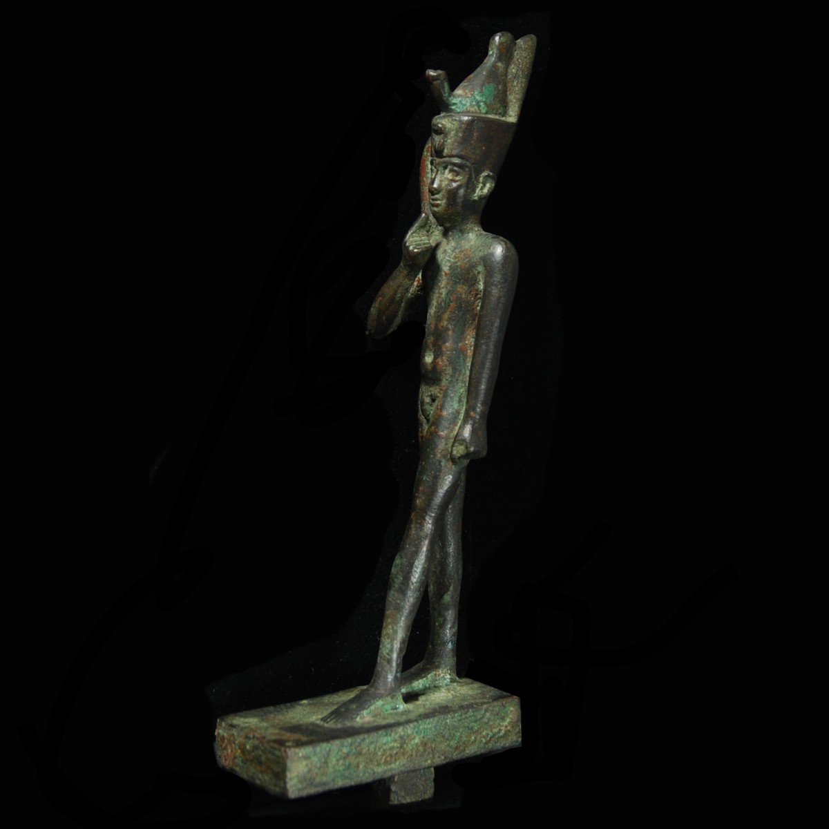 Egyptian Bronze statuette of Harpocrates half left