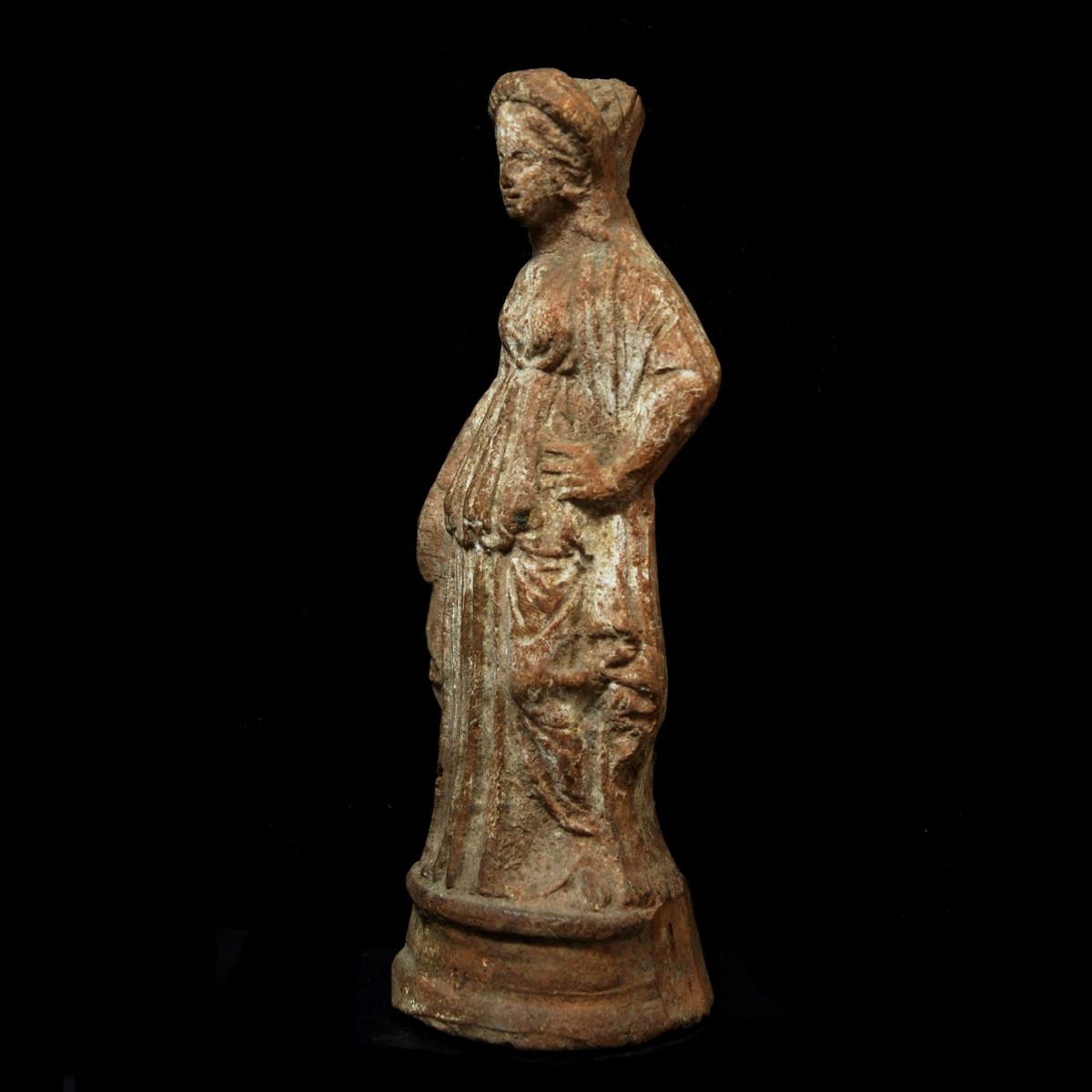 Cypriot terracotta statue of a woman half left