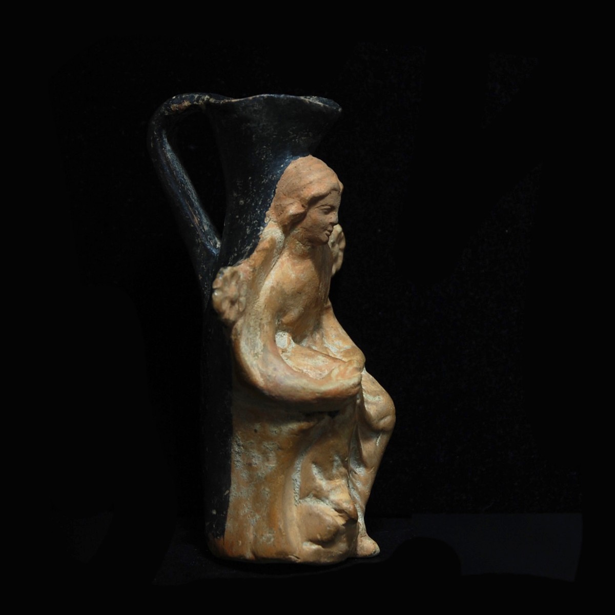 Greek figurative vase with Adonis right