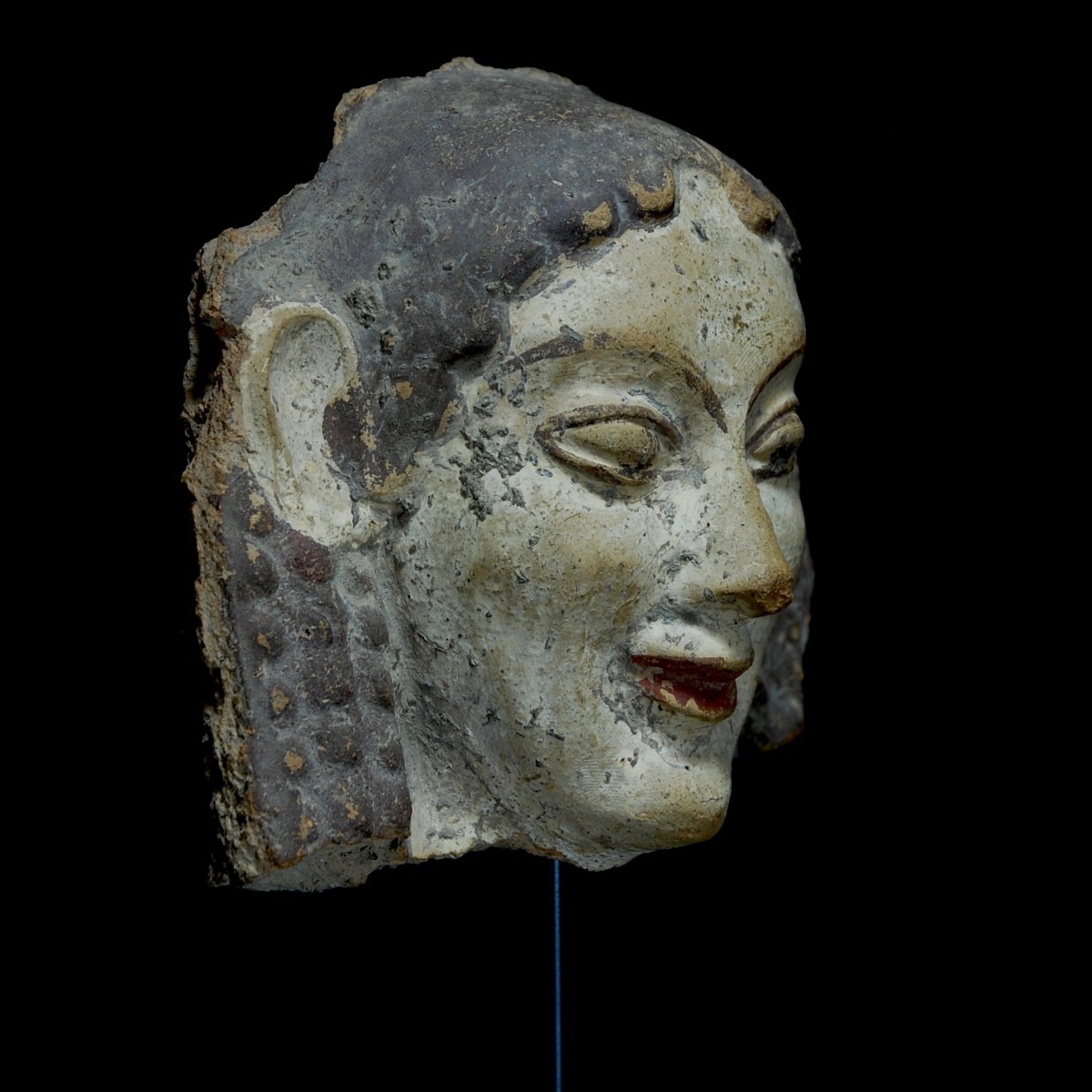 Etruscan archaic antefix half right