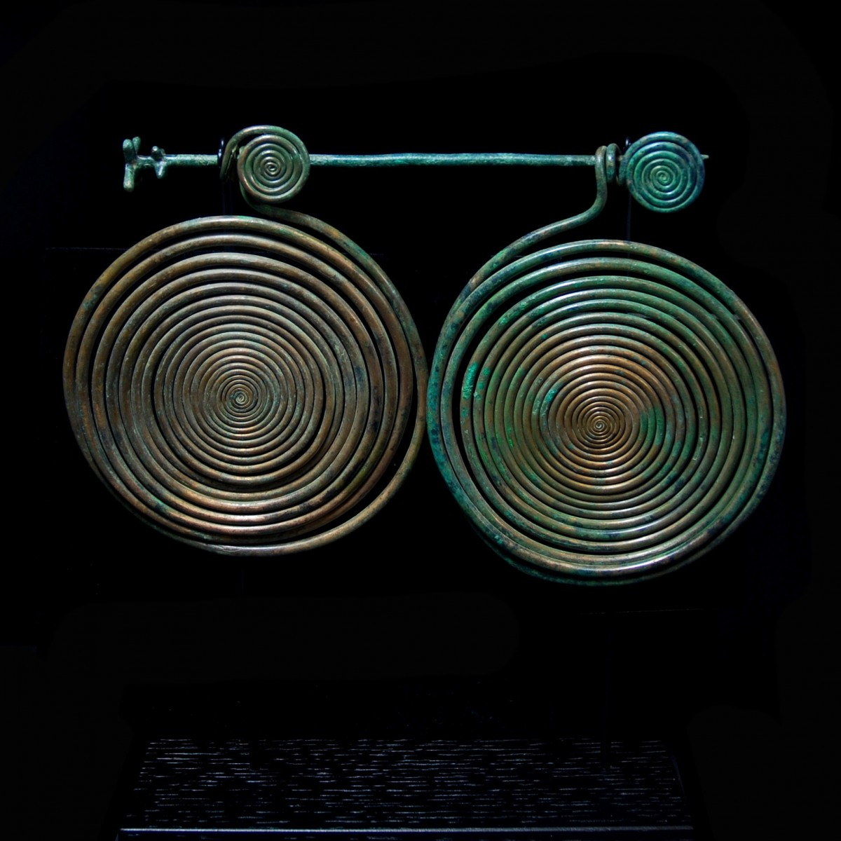 Large Bronze spirals with pin