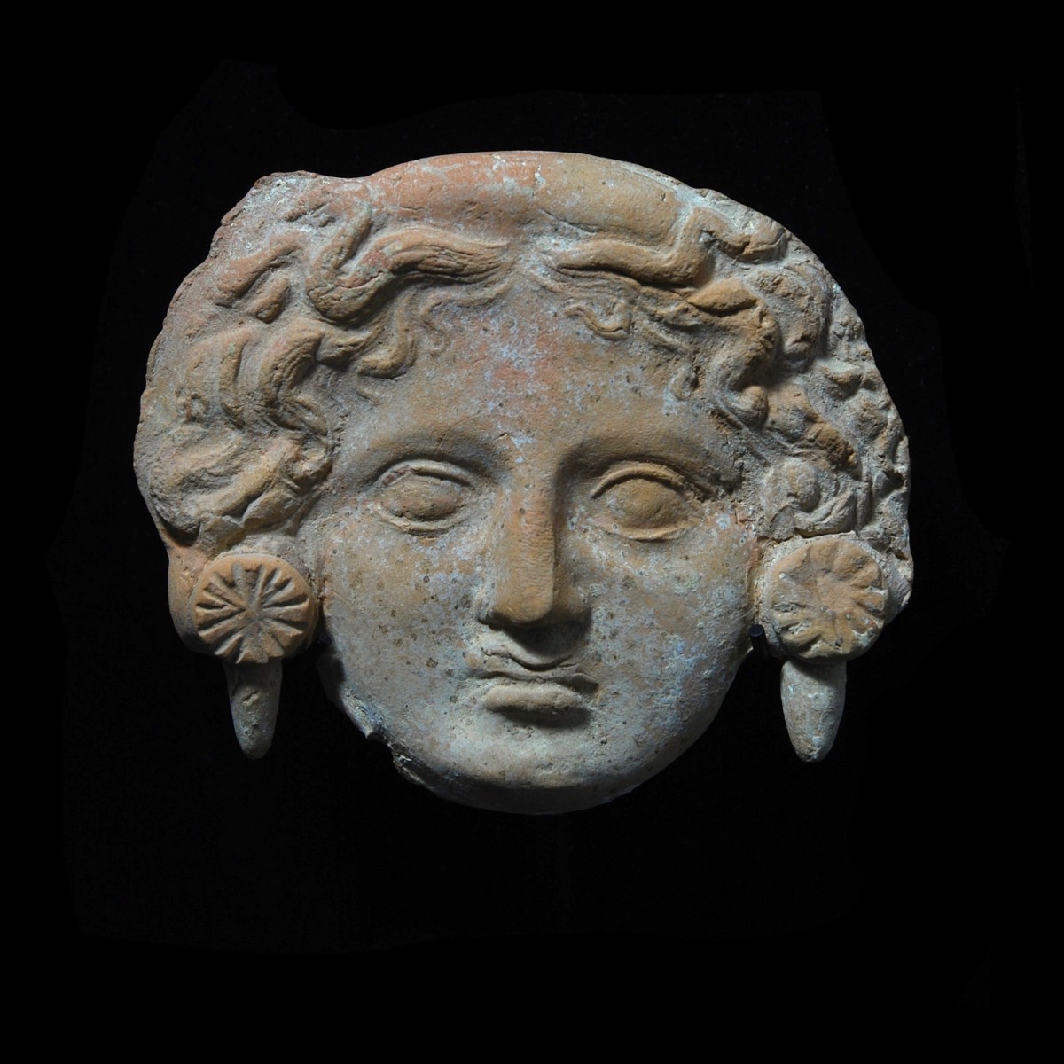 Terracotta head of a Gorgone