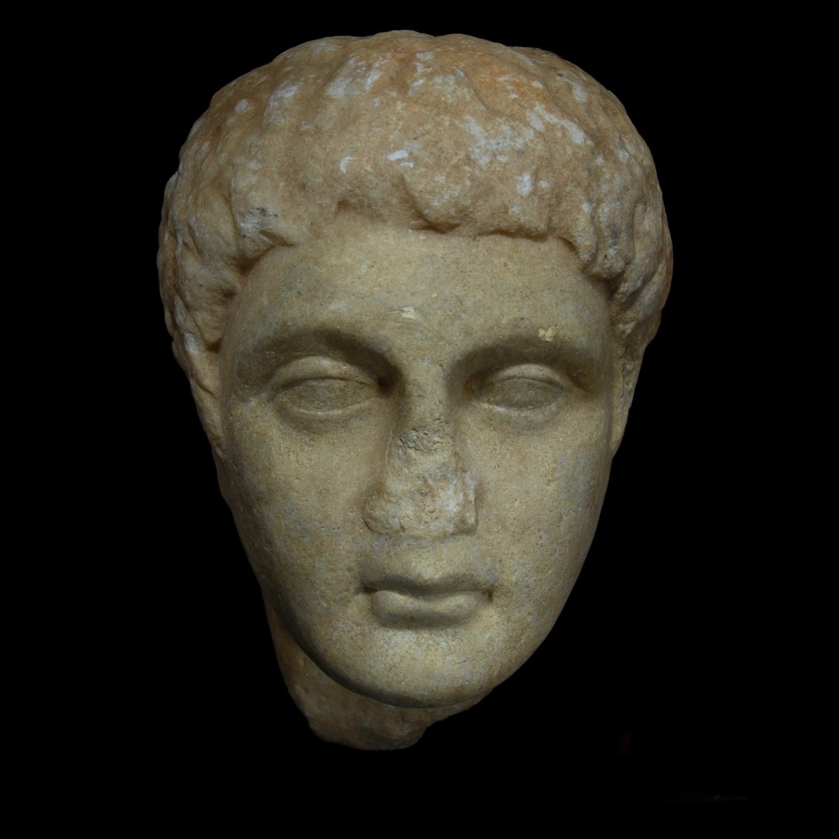 Greek marble relief head front