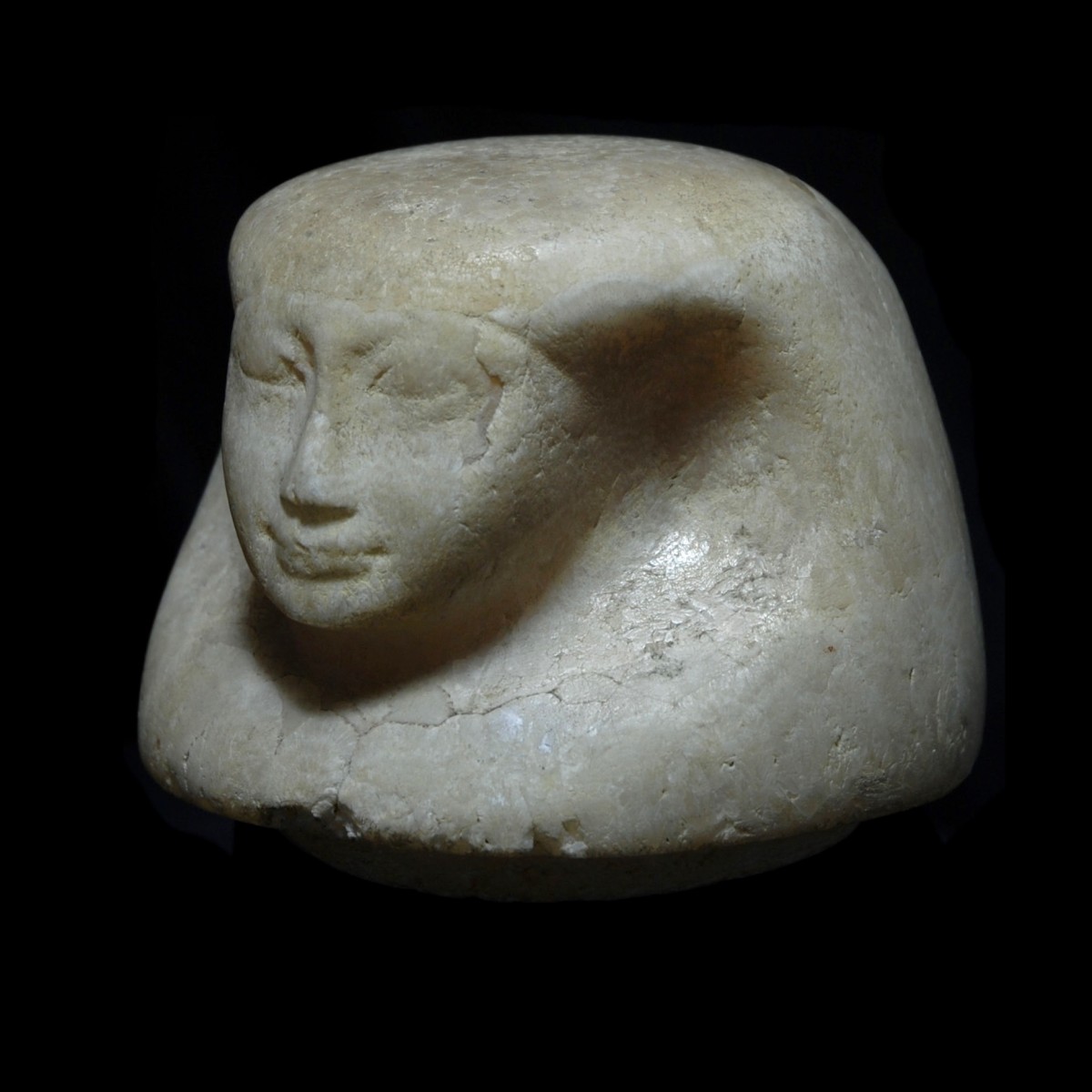 Alabaster canopic jar lid Amset left