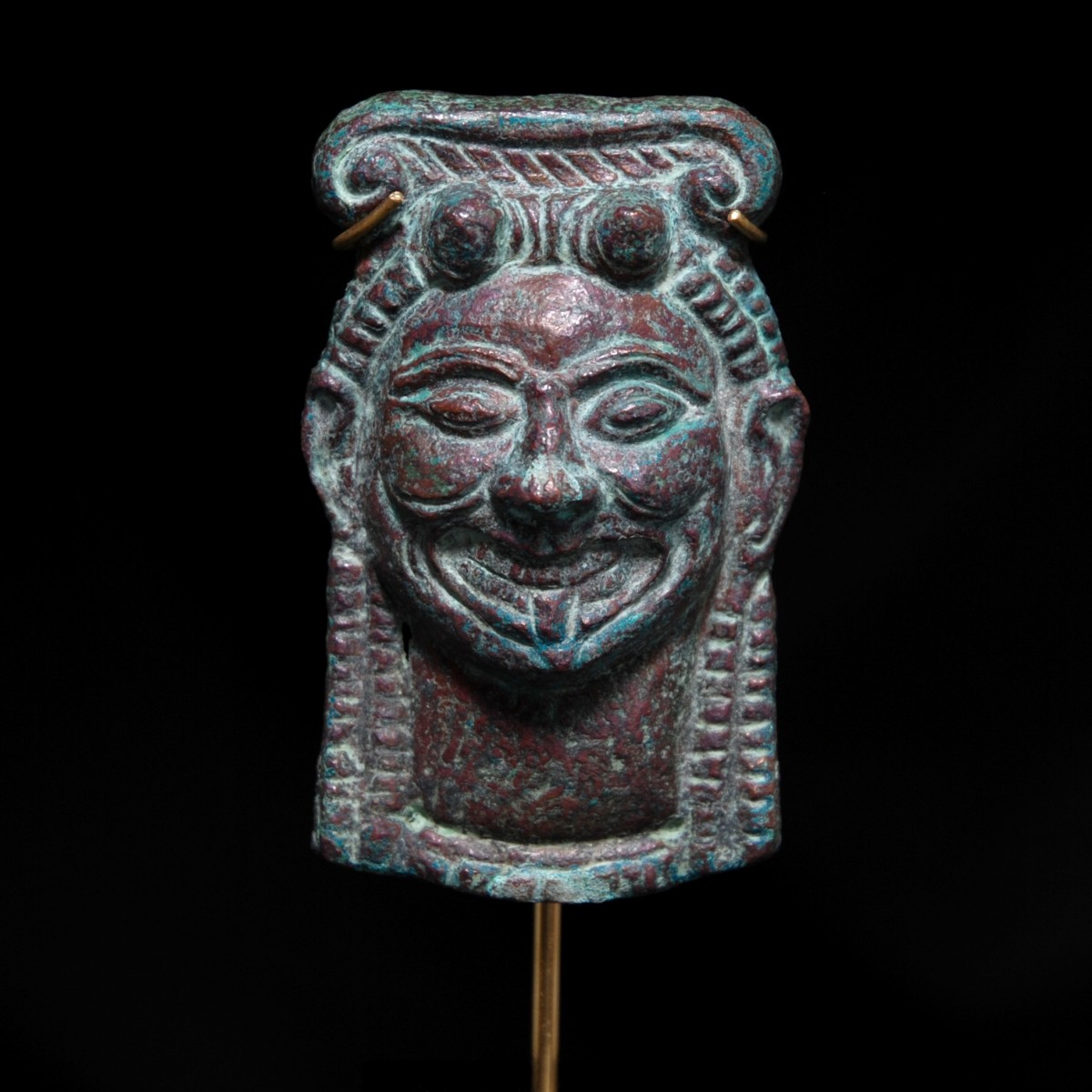 Etruscan bronze applique gorgone head