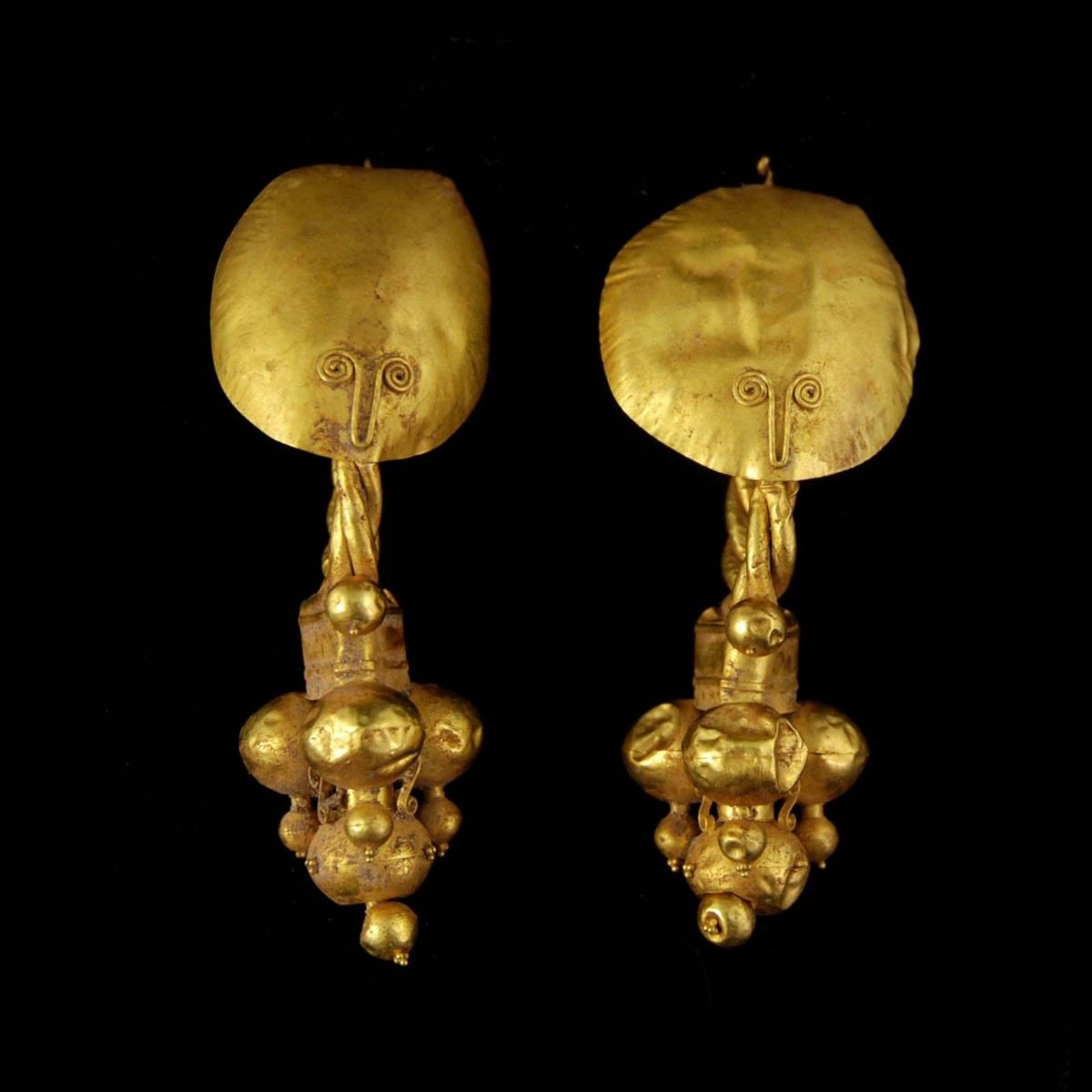 Roman Gold earrings with stilized faces