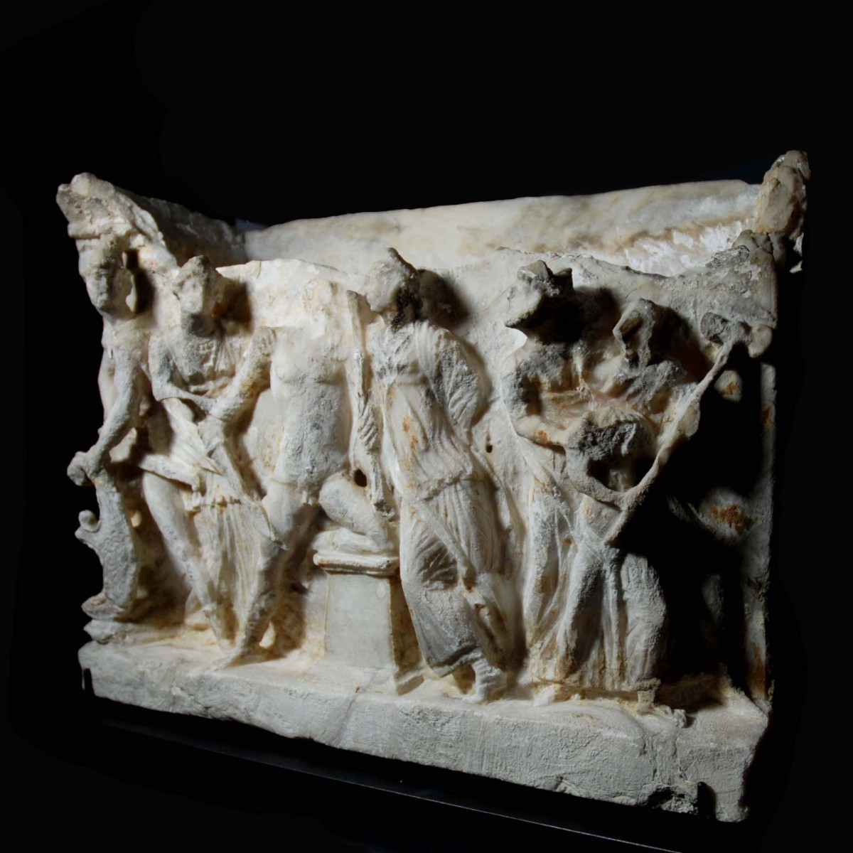 Etruscan alabaster cinerary urn showing the recognition of Paris right