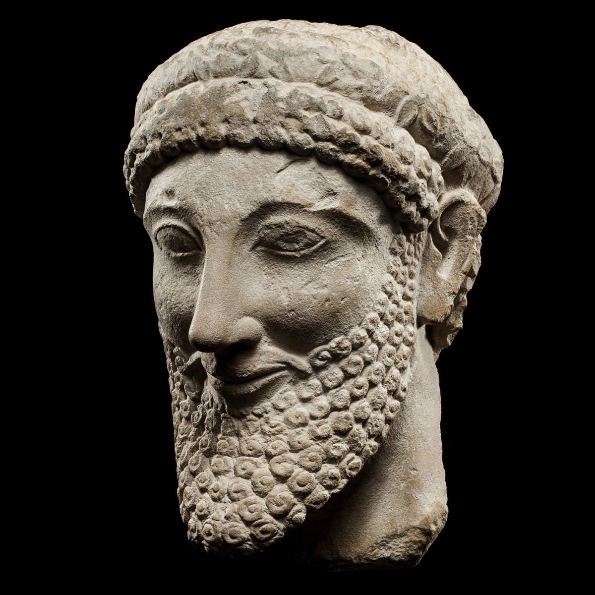 Cypriot limestone head of a votary half left