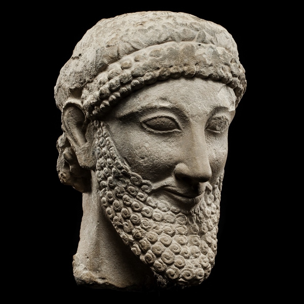 Cypriot limestone head of a votary half right