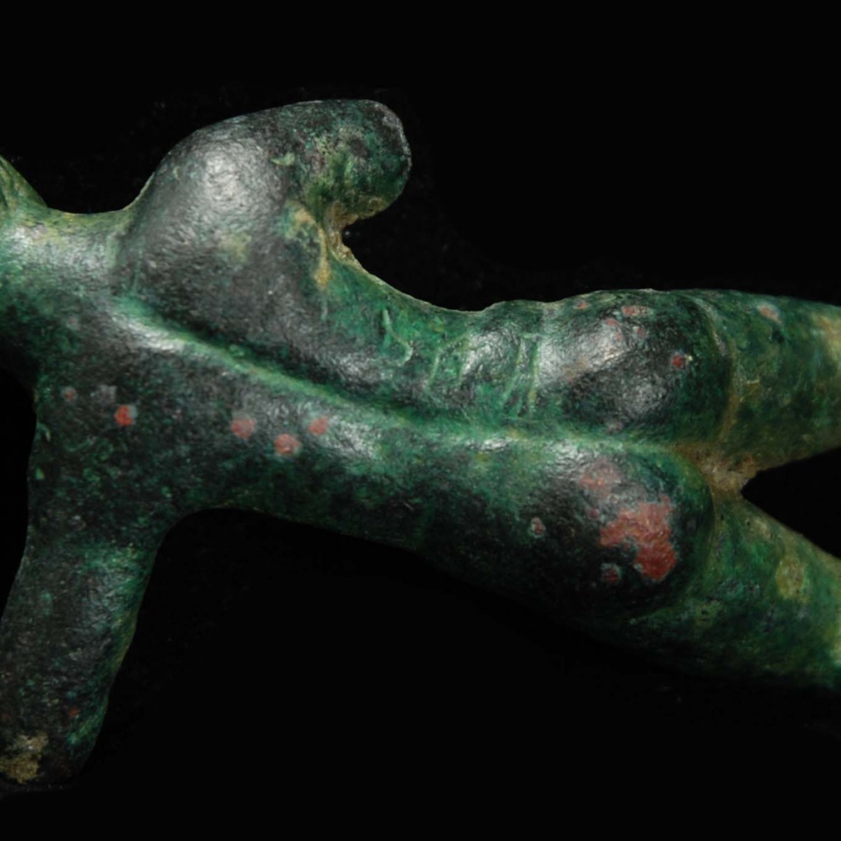 Etruscan Bronze votive figure of a youth with inscription detail