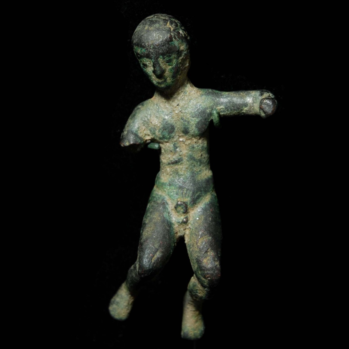 Etruscan votive figure of a youth with inscription