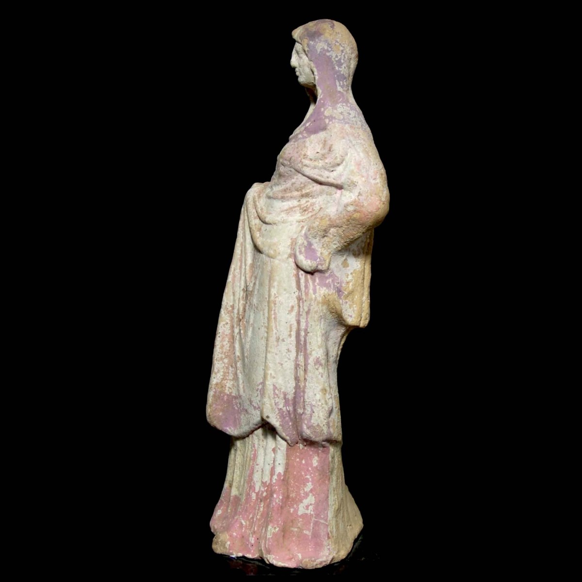 Hellenistic terracotta statuette of a woman from Canosa left