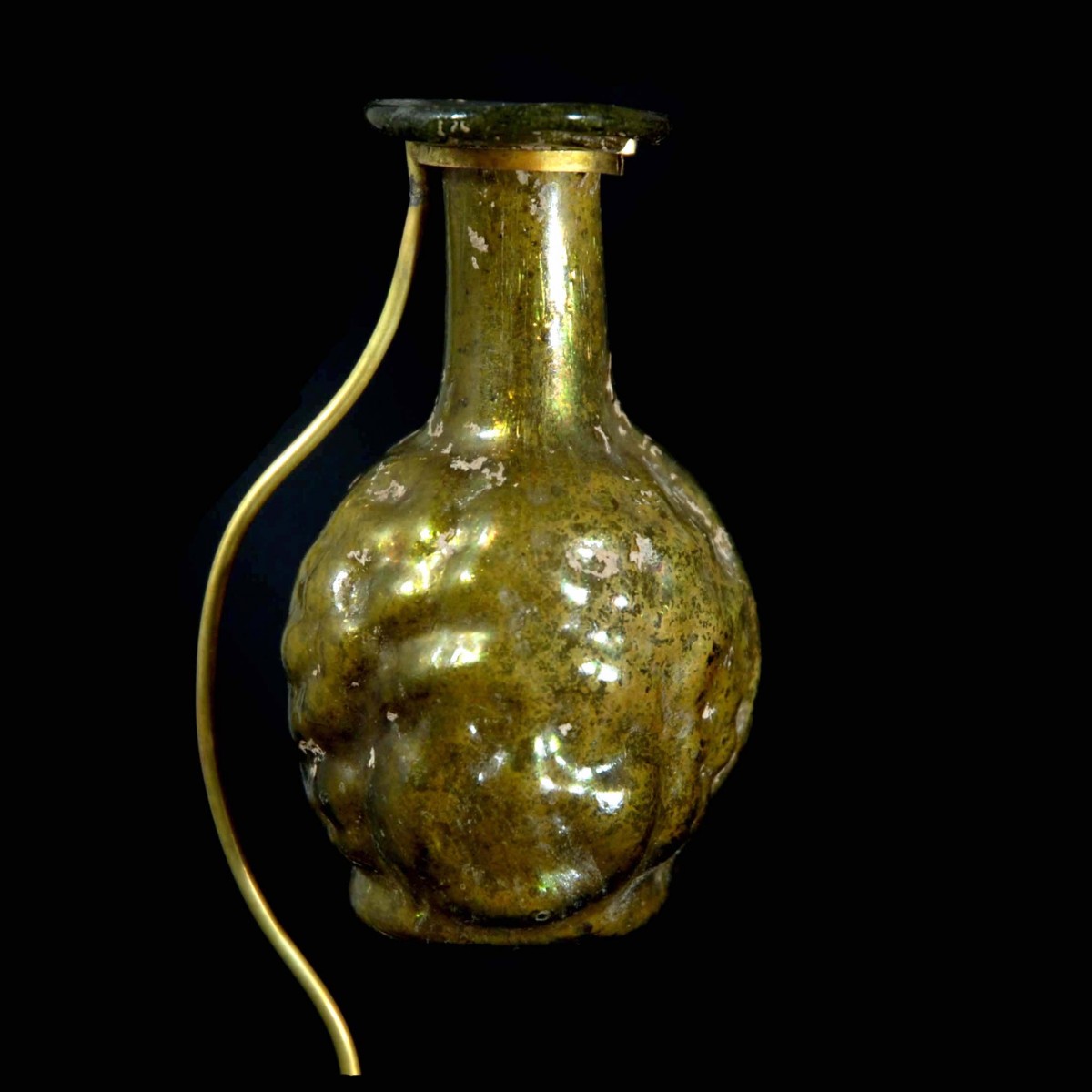 Roman janus headed glass flask A