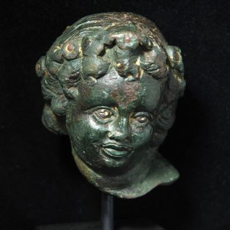 Splendid Bronze Head of a Childlike Bacchus