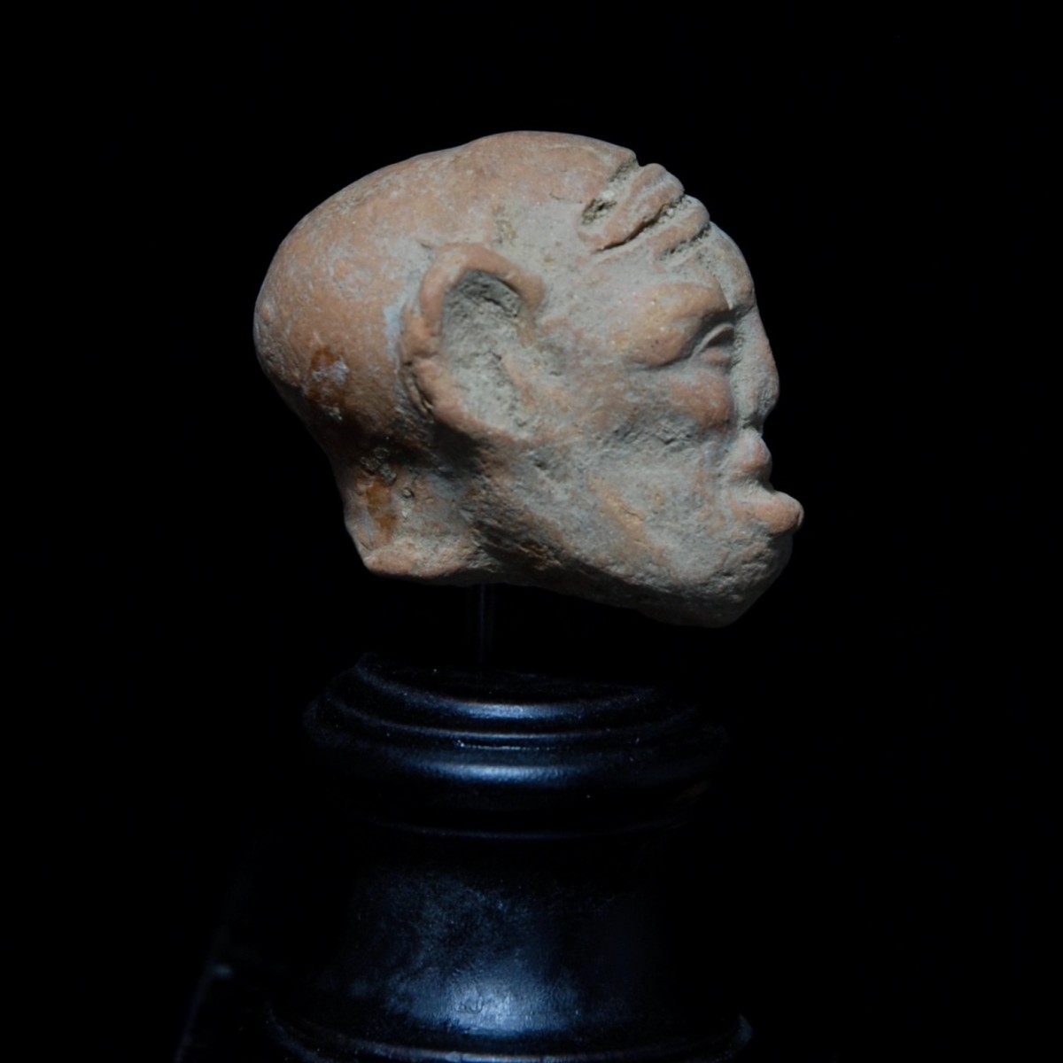 Hellenistic head of a grotesque III right