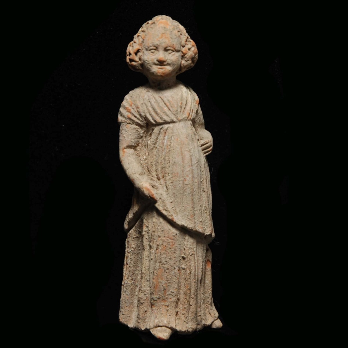 Tanagra statuette of a young girl