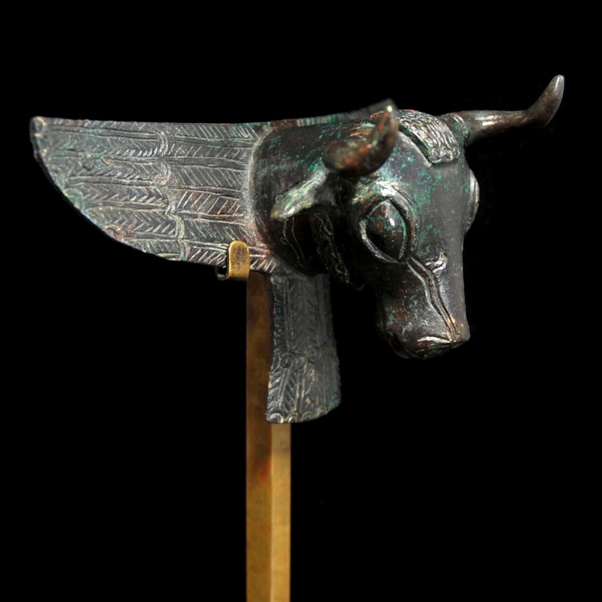 Urartian bronze applique of a bull half right