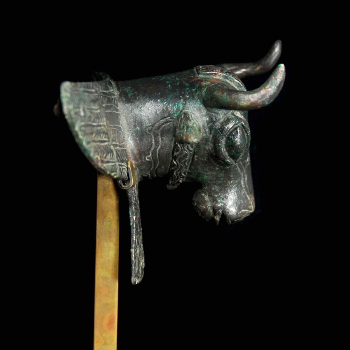 Urartian bronze applique of a bull right