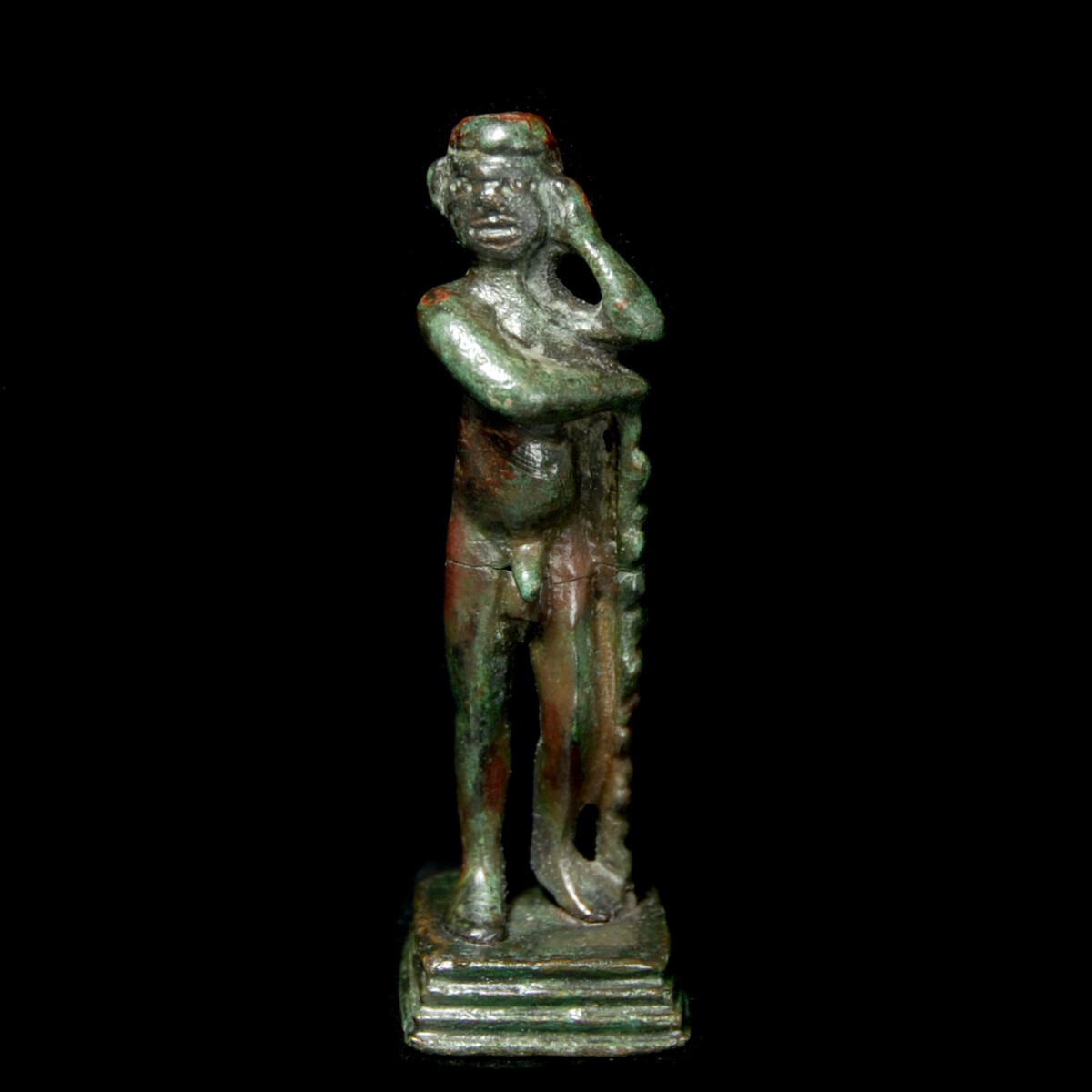Roman Bronze statuette of a man leaning on a stick