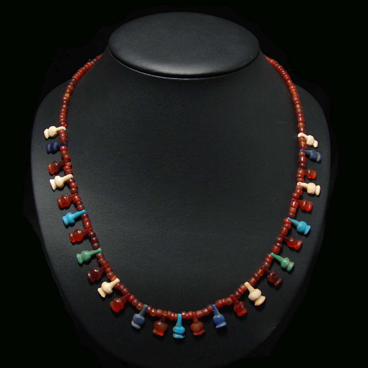 Egyptian carnelian and glass poppy head amulet necklace