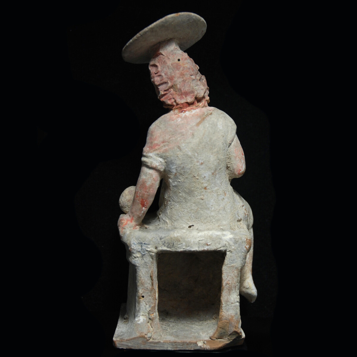 Hellenistic Tanagra statuette of a girl with sun hat and ball back