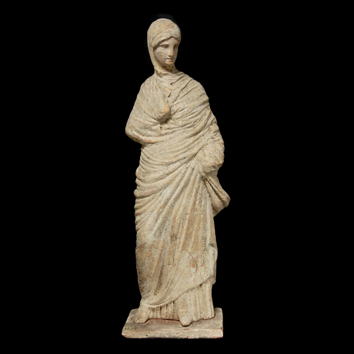 8 Tanagra statuette of a veiled woman
