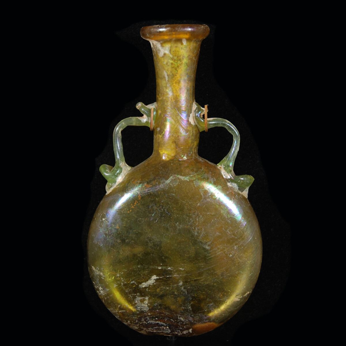 A Roman glass pilgrim flask with two handles