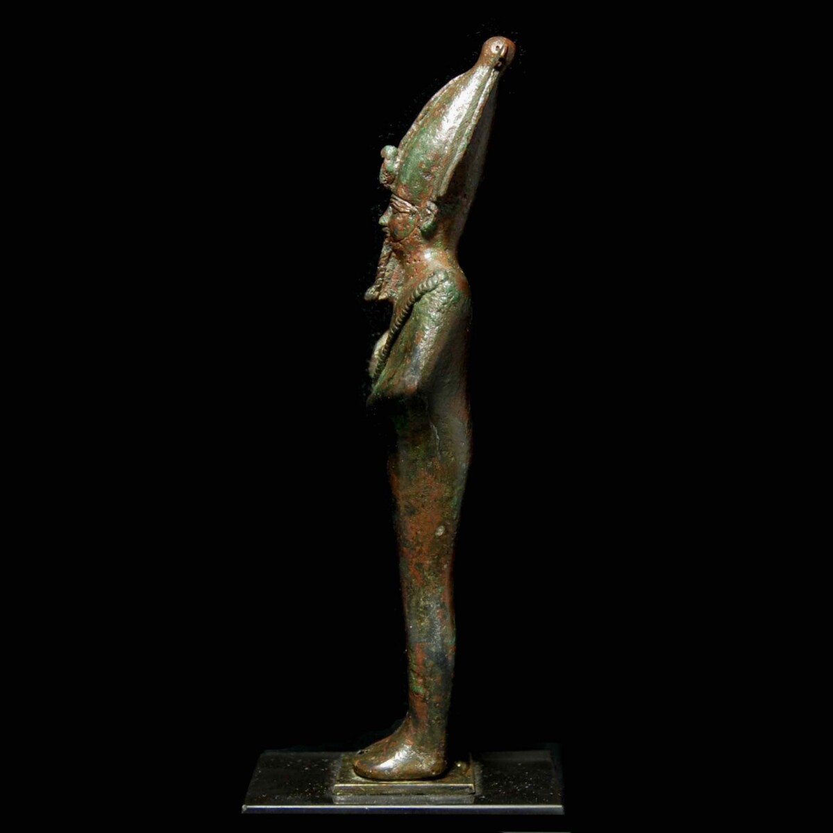 Egyptian bronze statuette of Osiris left