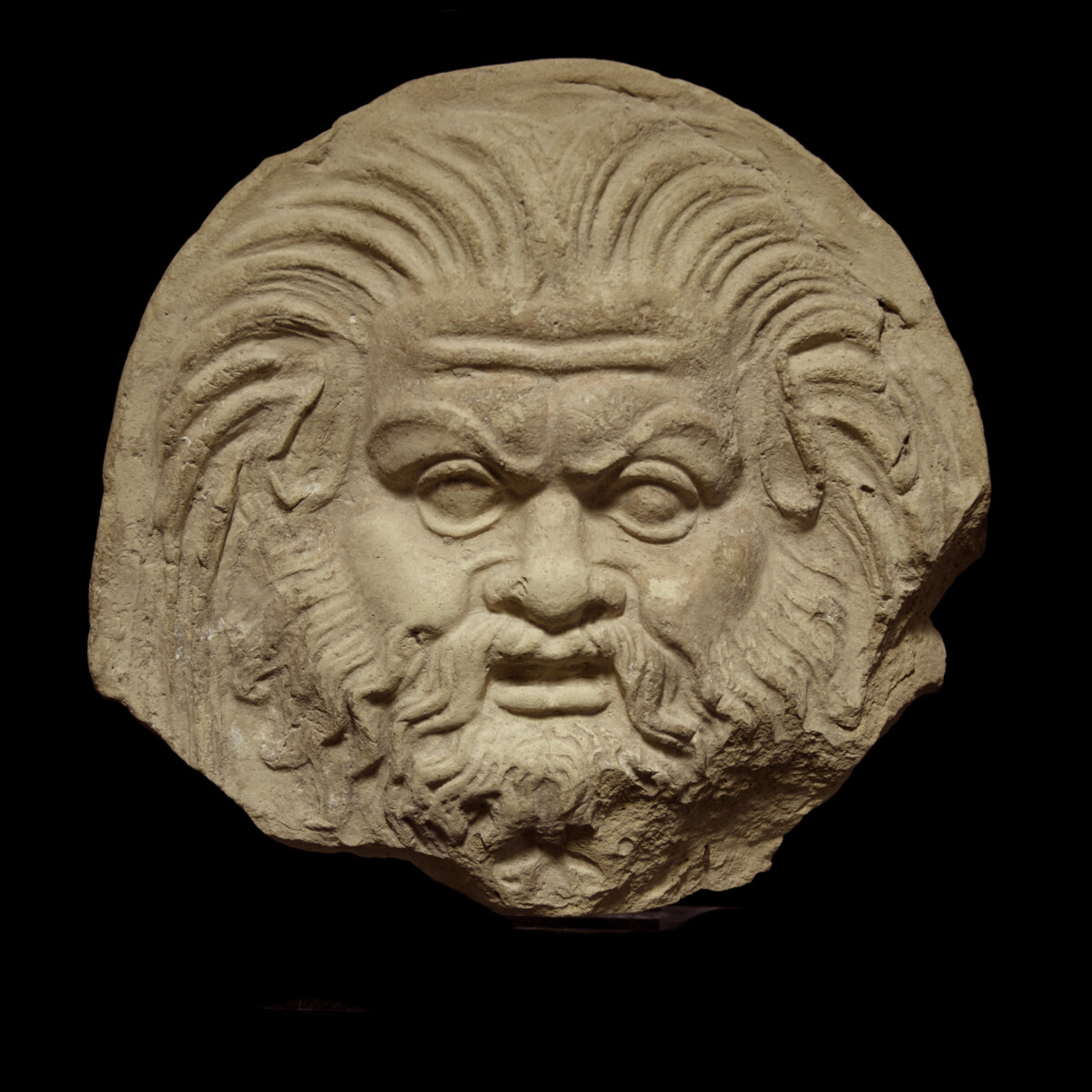 Terracotta Antefix of a bearded Silen