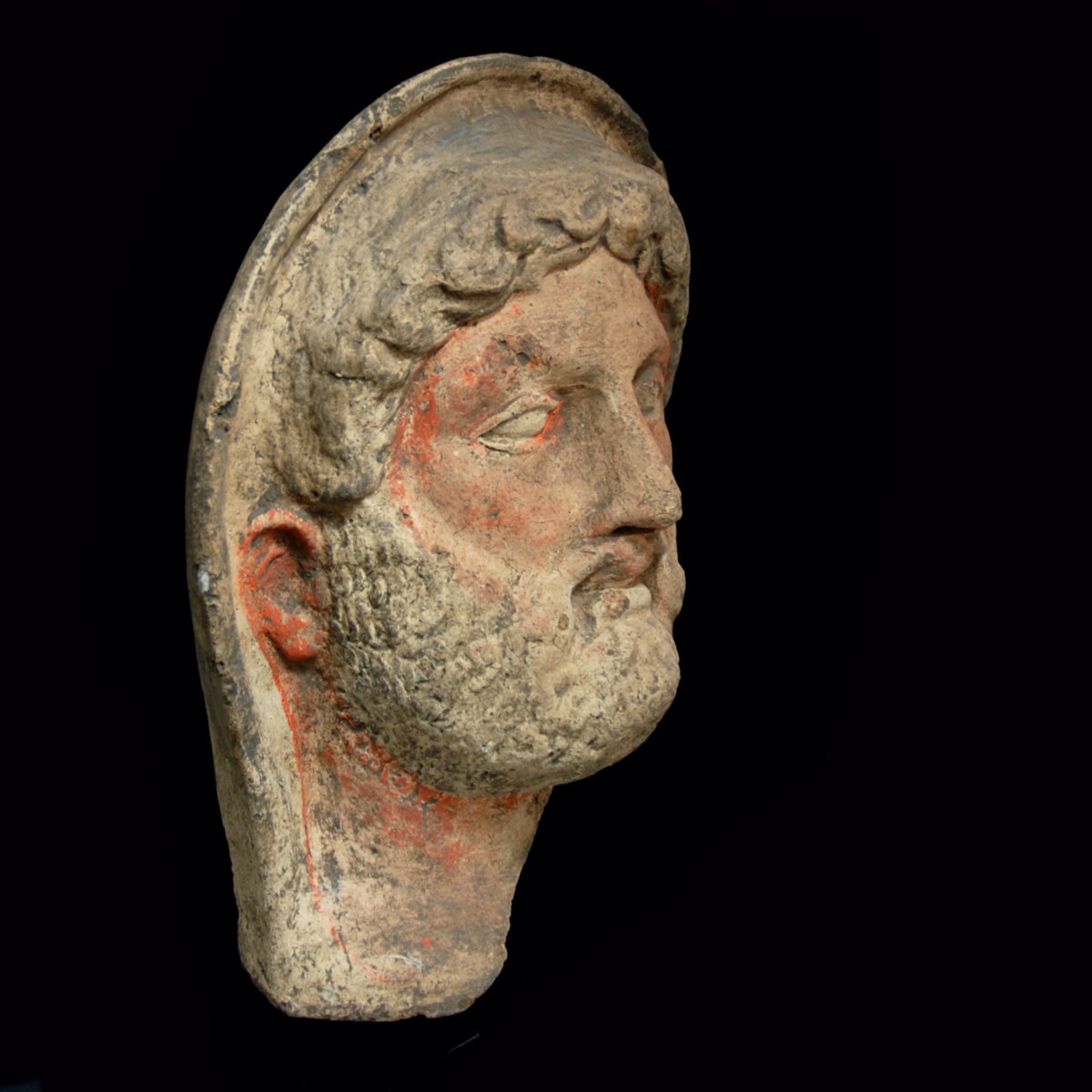 Etruscan terracotta votive head of a bearded man right