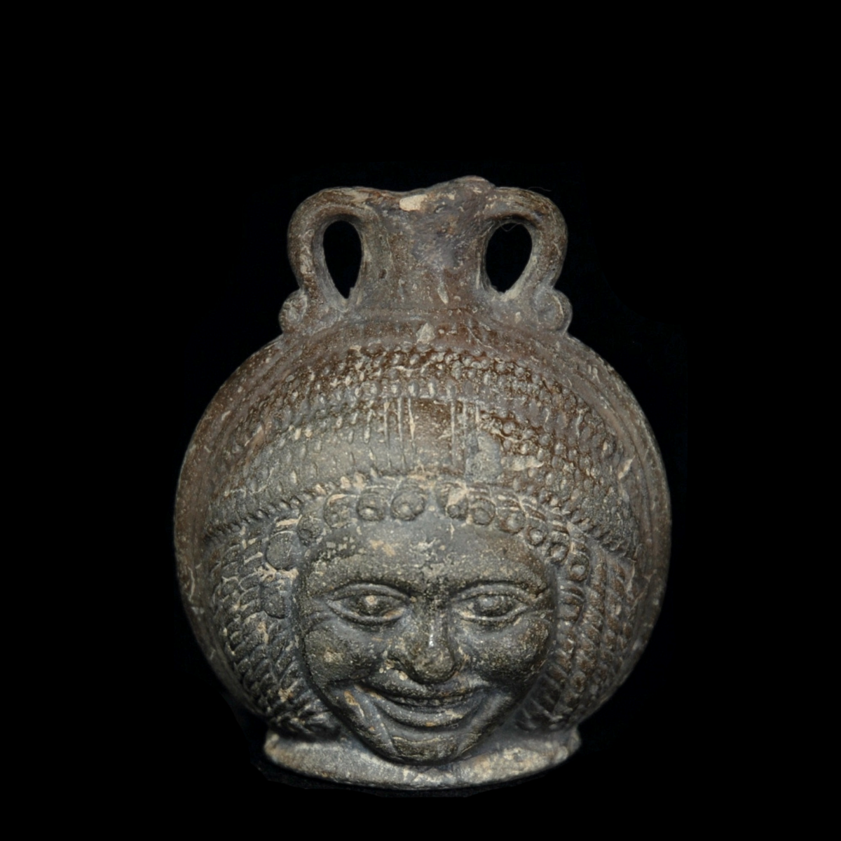 Egyptian janus head terracotta flask A