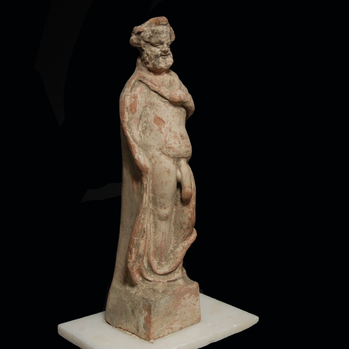 Hellenistic terracotta statuette of a silen right