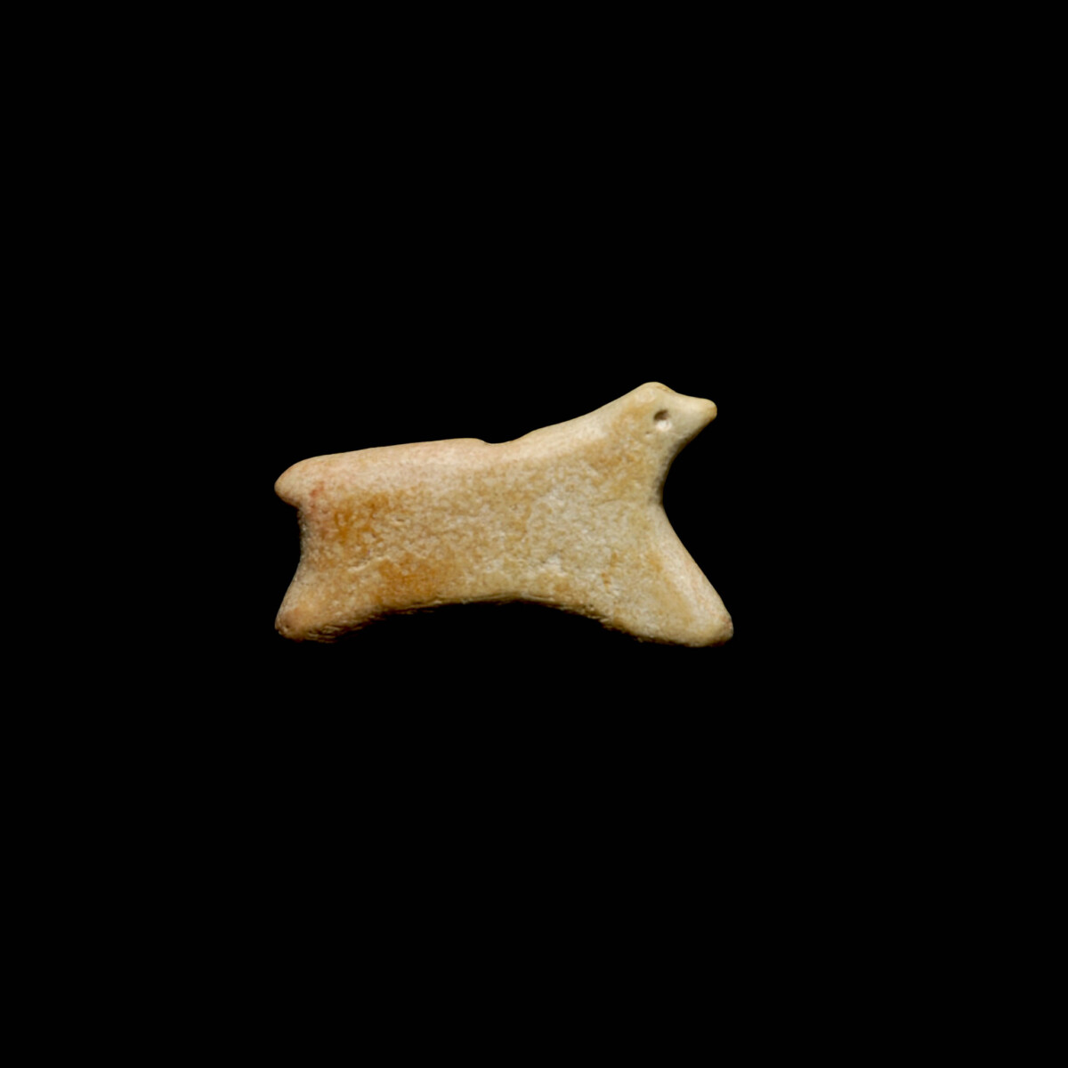 Jemdet nasr marble amulet of a running animal right