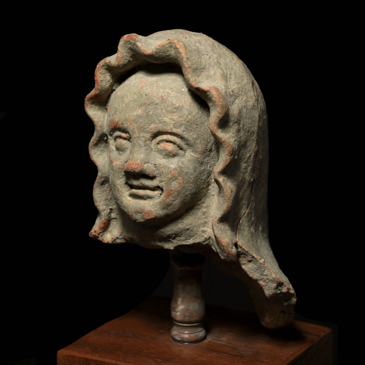 Etruscan terracotta head of a child left