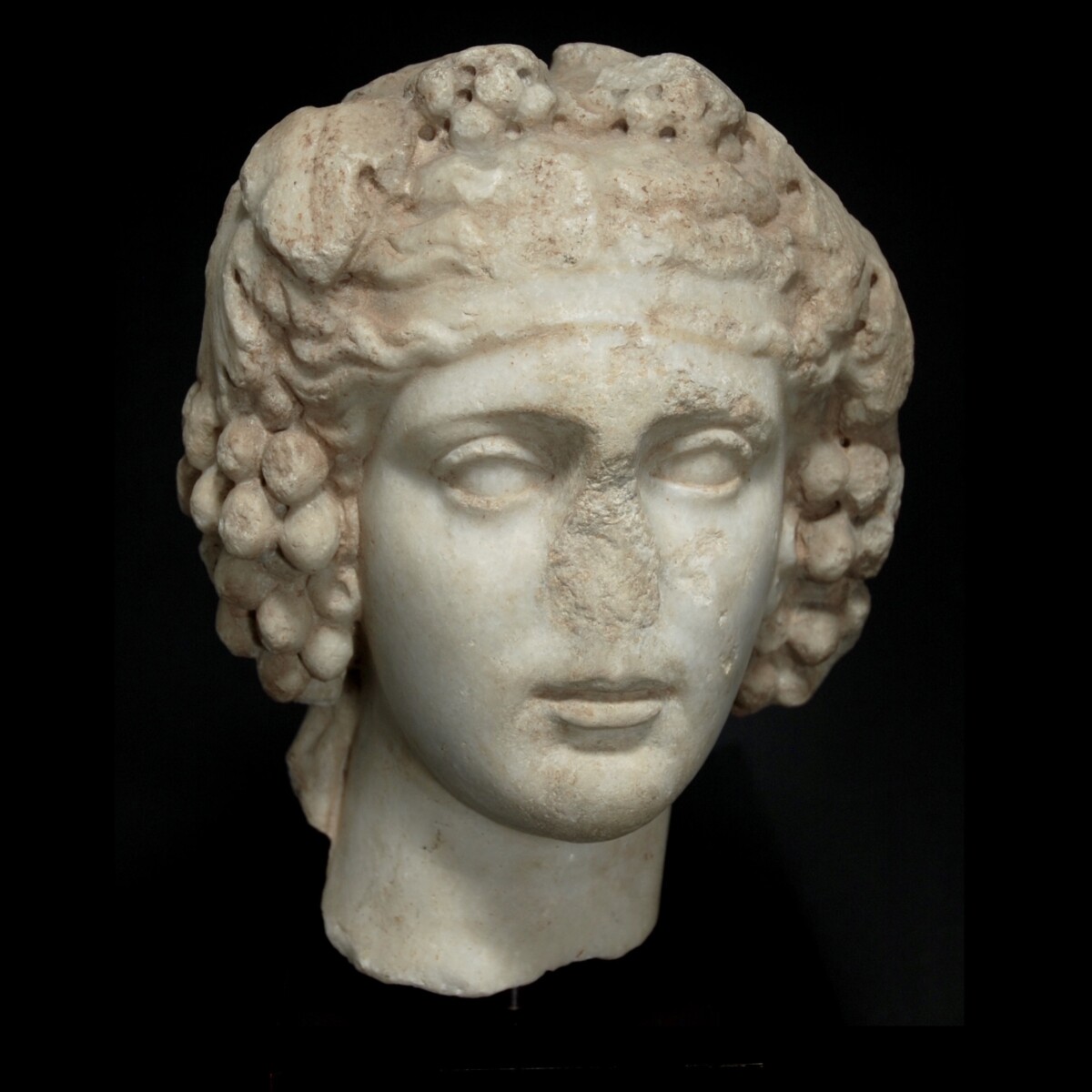 Marble head of Dionysus of the type Horti Lamiani best