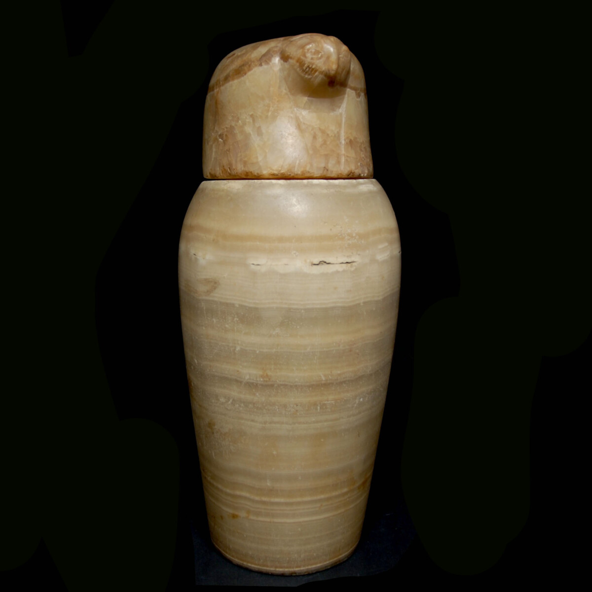 Egyptian canopic jar and lid from Quebehsenuef right