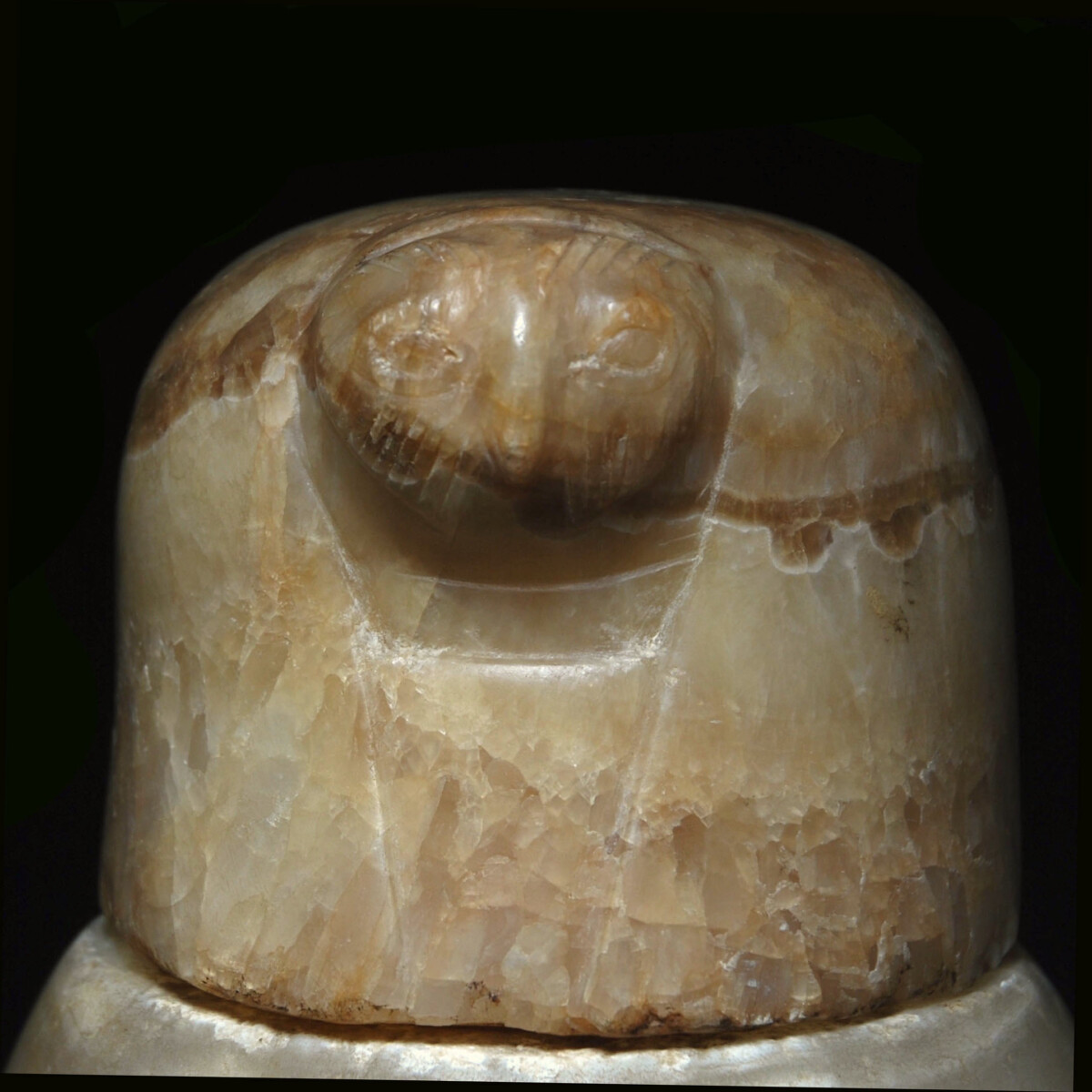 Egyptian canopic jar lid of Qebehsenuef front