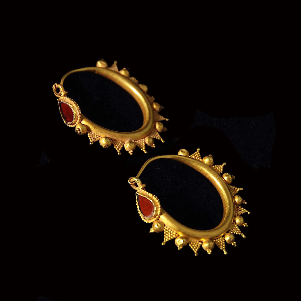 Greek gold hoop earrings with garnet